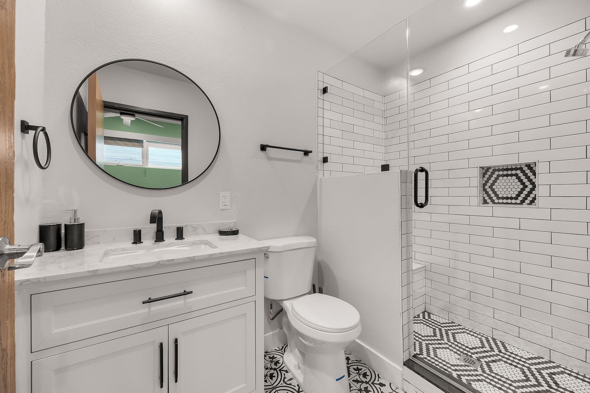 Shower, hair dryer, towels, shampoo