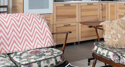 Modern architecture meets warm, eclectic comfort with a dash of Irish charm.