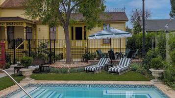 Outdoor pool, open 10:00 AM to 9:00 PM, pool umbrellas, sun loungers