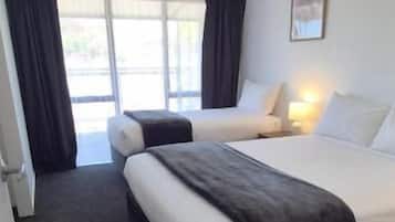 Apartment, 2 Bedrooms, Patio, Courtyard View | Iron/ironing board, WiFi (free)