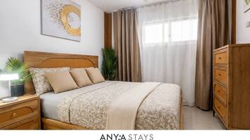 1 habitación, tabla de planchar con plancha, internet y ropa de cama