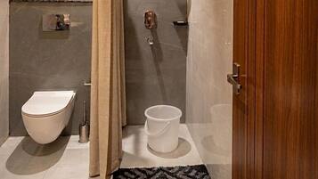 Shower, free toiletries, hair dryer, slippers