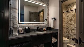 Double Room, 2 Queen Beds, Courtyard View | Bathroom | Shower, free toiletries, hair dryer, towels
