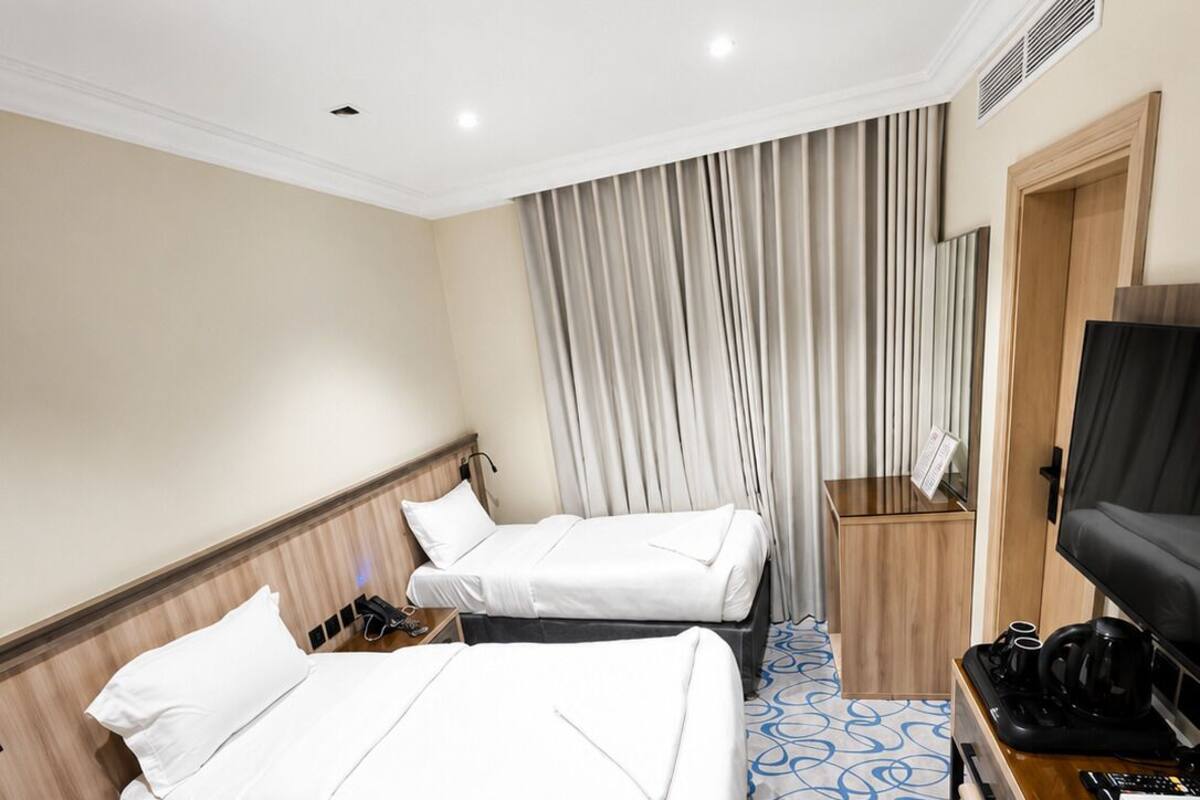 Chambre Deluxe Double ou avec lits jumeaux | Bureau, Wi-Fi gratuit