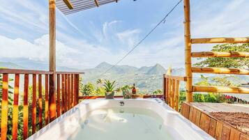 Cabin, 2 Bedrooms, Smoking, Patio | Outdoor spa tub