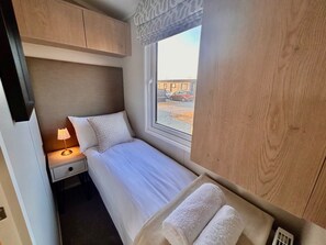 4 habitaciones, tabla de planchar con plancha, wifi y ropa de cama 