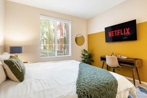 1 bedroom, desk, iron/ironing board, travel cot