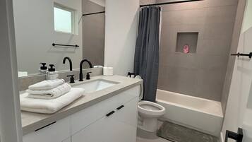 Hair dryer, bidet, towels, soap
