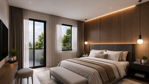 A modern bedroom with a large bed, a bench, a TV, and a view of greenery outside. - BRAND NEW The Palm Reserve Luxury Beach Villa Thailand (4 bedrooms/ 5 bathrooms) (Pak Nam Pran)