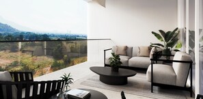 A modern balcony with a sofa, a coffee table, and a chair. - BRAND NEW The Palm Reserve Luxury Beach Villa Thailand (4 bedrooms/ 5 bathrooms) (Pak Nam Pran)