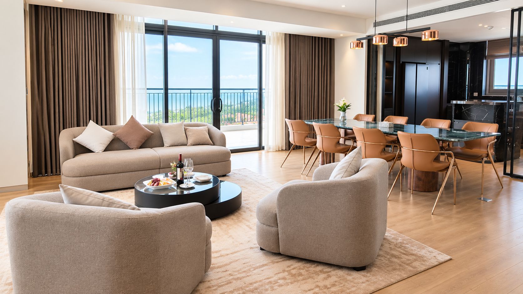 A modern living room with a sofa, armchairs, a dining table with chairs, and a kitchen area.