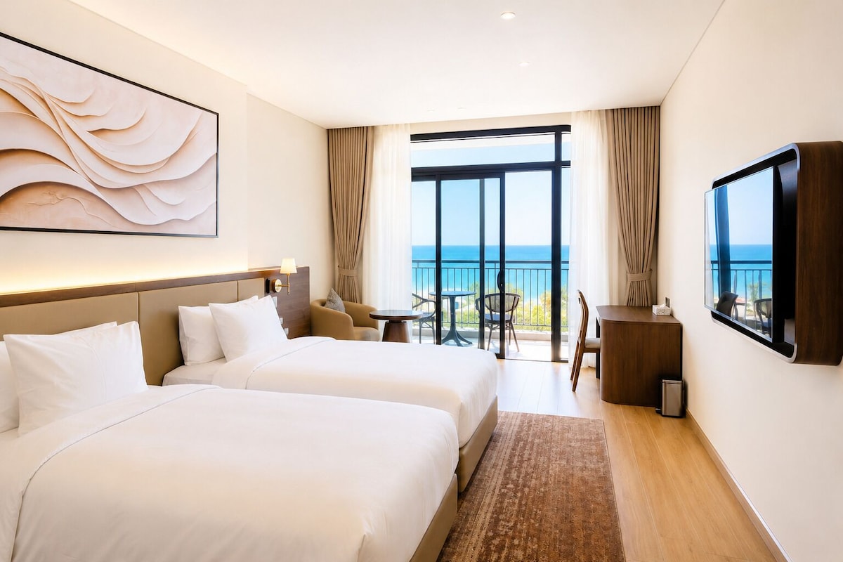 Deluxe Room, Beach View | In-room safe, blackout drapes, iron/ironing board, WiFi (free)