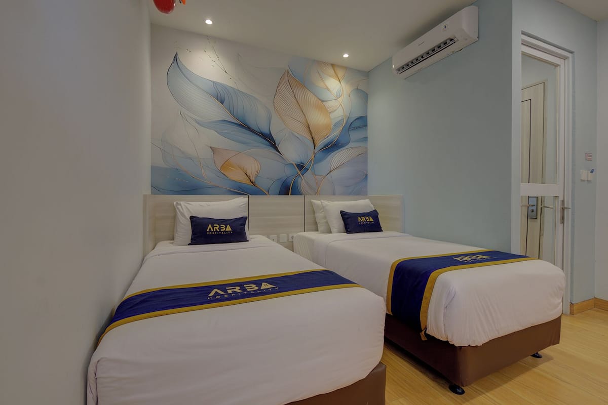 Quarto duplo executivo | Escrivaninha, Wi-Fi de cortesia, roupa de cama