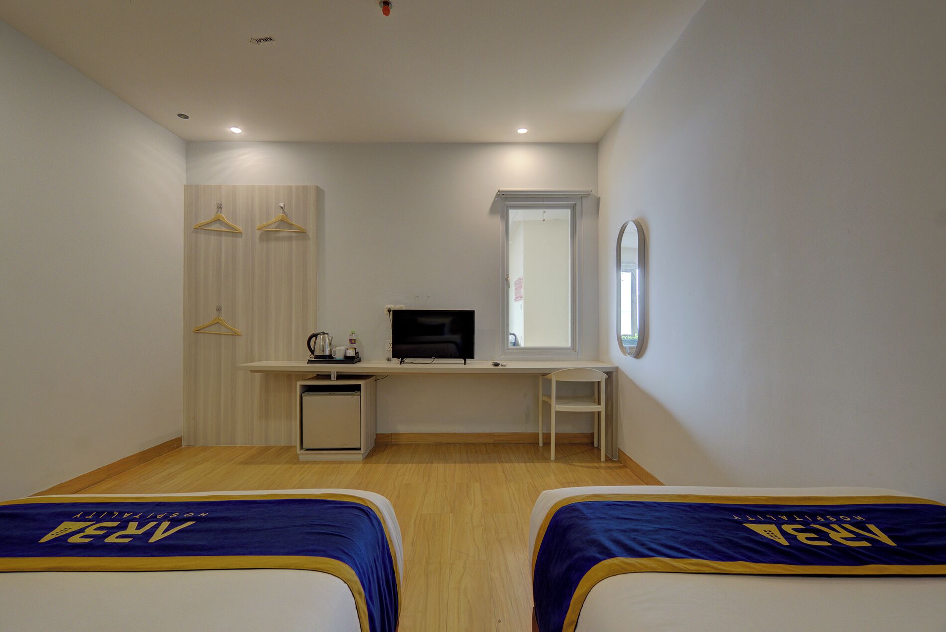 Habitación ejecutiva con 2 camas individuales | Escritorio, wifi gratis y ropa de cama 