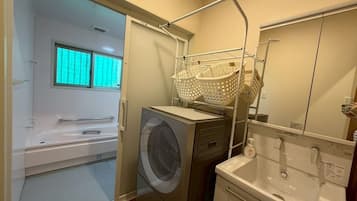 Hair dryer, bidet, towels, soap