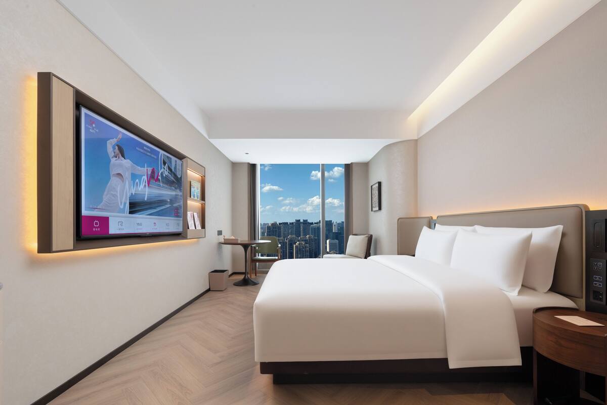 Habitación individual estándar, vista a la ciudad | Minibar, cortinas blackout, tabla de planchar con plancha y wifi gratis 