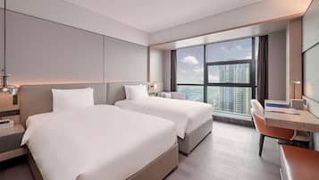 Deluxe Twin Room, City View | In-room safe, desk, blackout curtains, iron/ironing board