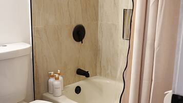 Hair dryer, towels, soap, toilet paper
