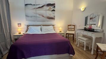 1 slaapkamer, een strijkplank/strijkijzer, wifi, beddengoed