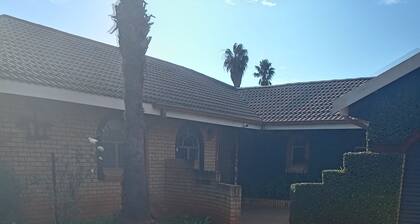Luxurious 4-Bedroom House Rental with Pool Access in Ngaka Modiri Molema