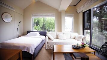 Suite Luxury | Copriletto in piuma, una scrivania, tende oscuranti, Wi-Fi gratuito