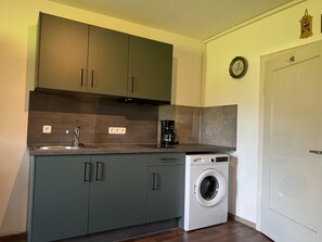 Coffee/tea maker, fridge, stovetop, electric kettle