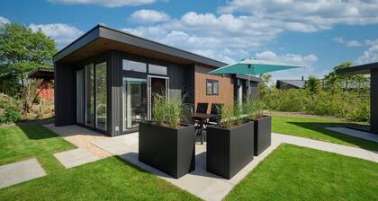 Chalet Strandloper K04 privately situated near Northsea and beach of Renesse