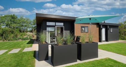 Chalet Strandloper K04 privately situated near Northsea and beach of Renesse