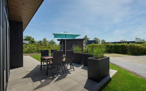 Chalet Strandloper K04 privately situated near Northsea and beach of Renesse