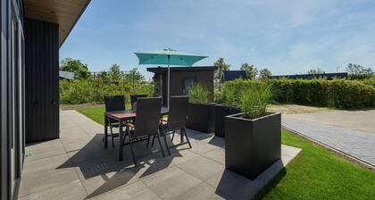Chalet Strandloper K04 privately situated near Northsea and beach of Renesse
