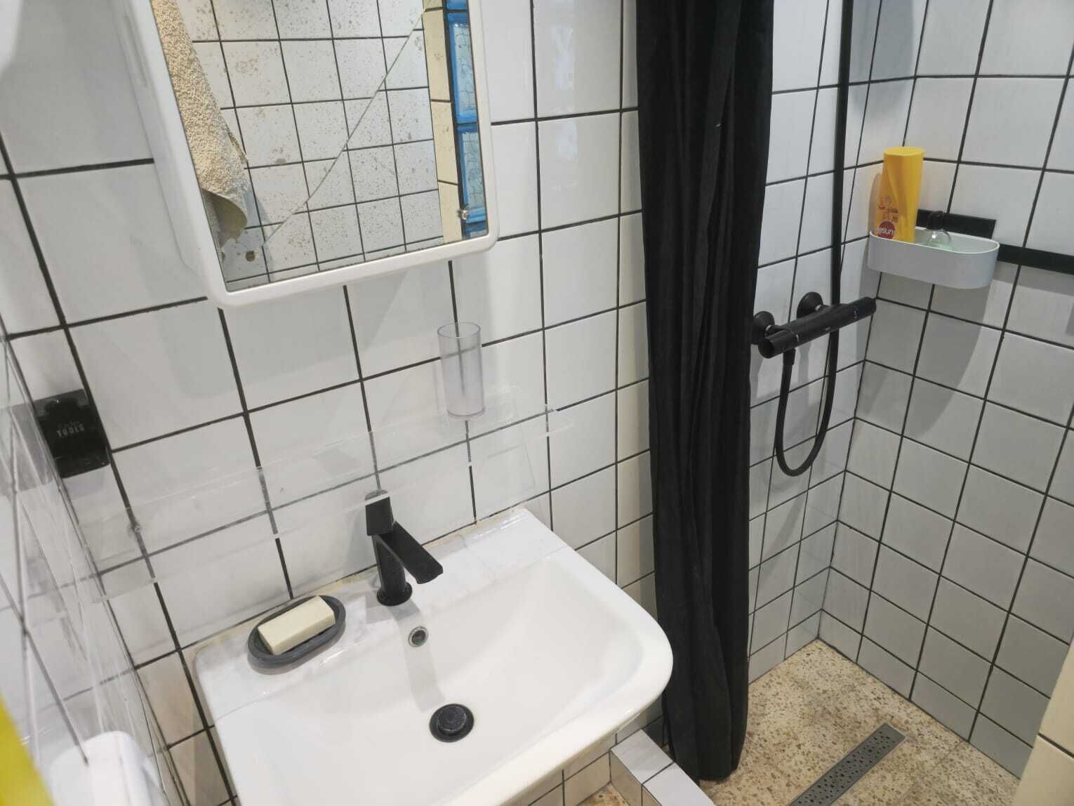 Shower, towels, soap, toilet paper