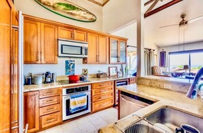 Coffee/tea maker, fridge, microwave, oven