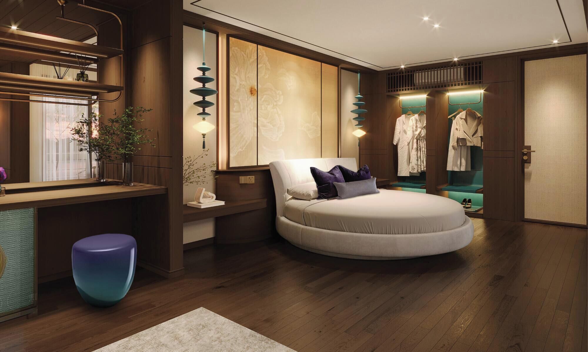 A modern bedroom with a circular bed, wooden flooring, a vanity with a mirror, and a clothing rack.