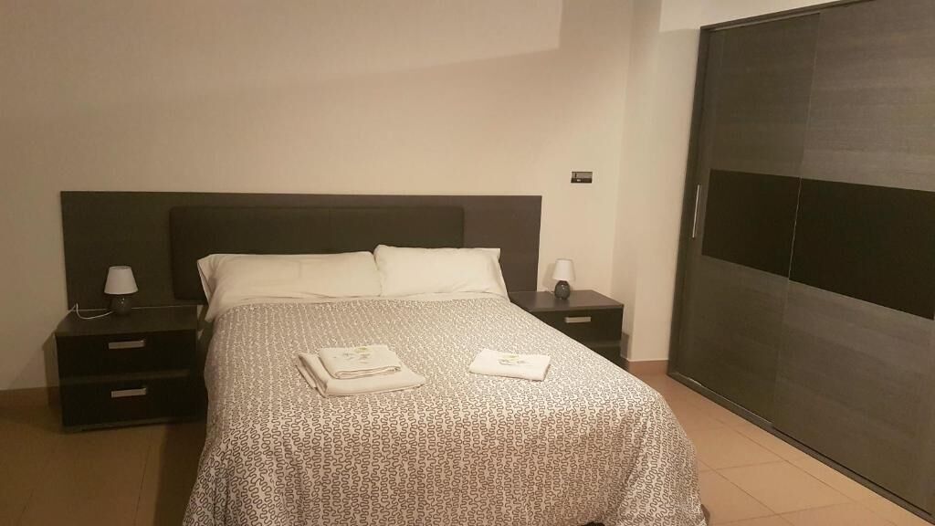 Suite familiar, balcón, vistas a la ciudad | Escritorio y wifi gratis
