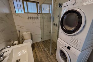 Hair dryer, towels, soap, toilet paper