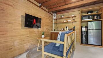 Villa, 1 Bedroom, Garden View | Living area | 43-inch Smart TV with cable channels, Netflix, streaming services