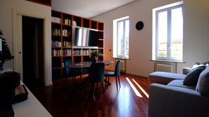 Living area - A comfortable flat of 50sqm, ideal for four people, located on the third floor of a building without an elevator (access via stairs).The property is situated in the historic center, within the restricted traffic zone, just steps away from the Cathedral & (Piacenza)