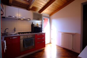 Private kitchen - A comfortable flat of 50sqm, ideal for four people, located on the third floor of a building without an elevator (access via stairs).The property is situated in the historic center, within the restricted traffic zone, just steps away from the Cathedral & (Piacenza)