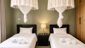 Luxury Apartment, Patio, Courtyard View | Blackout drapes, iron/ironing board (on request), WiFi (free)