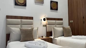 Habitación familiar | Caja fuerte, wifi gratis, ropa de cama