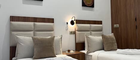 Family Room | In-room safe, WiFi (free), bed sheets