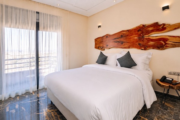 Premium Suite, Partial Sea View | Premium bedding, down comforters, in-room safe, laptop workspace