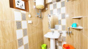 Shower, rainfall showerhead, slippers, towels