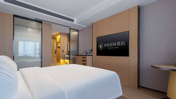 Premium bedding, down duvets, blackout curtains, soundproofing