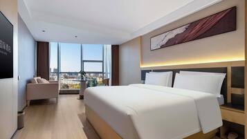 Premium bedding, down duvets, blackout curtains, soundproofing