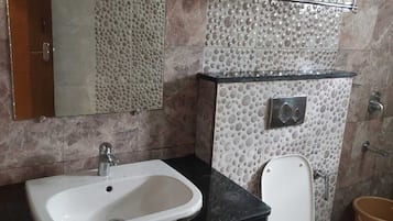Shower, towels, soap, shampoo