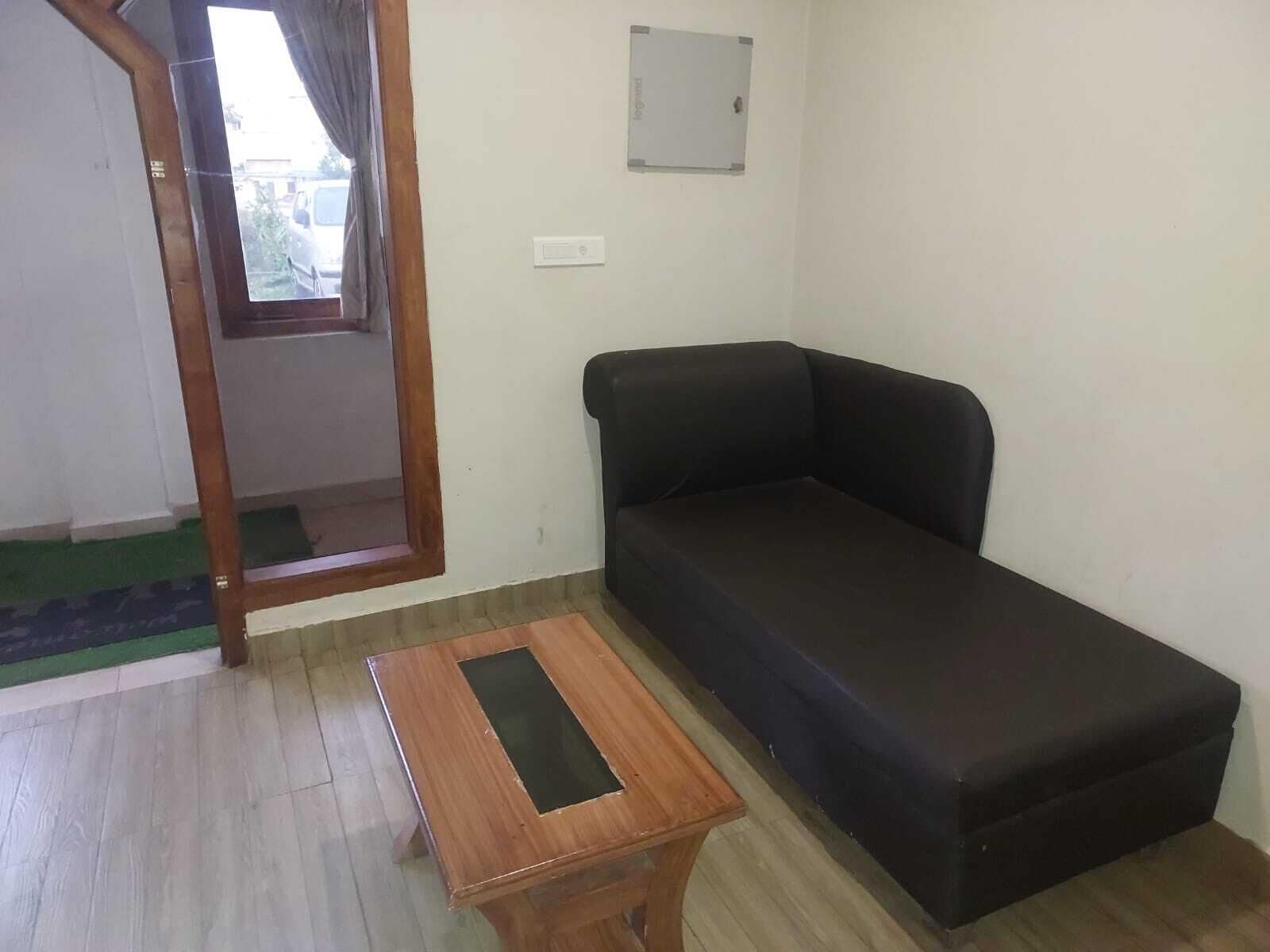 Family Suite | Living area | 32-inch LED TV with satellite channels