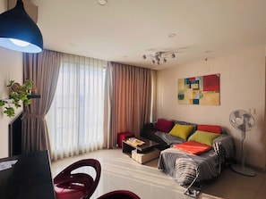 Family Apartment, 2 Bedrooms, Balcony, City View | Living area - Green Valley EmHouse (Ho Chi Minh City)