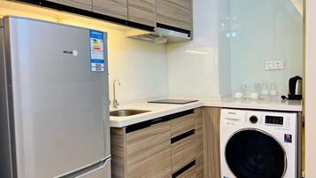 Departamento básico, vista a la ciudad | Cocina privada