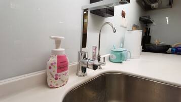Departamento estándar, vista a la ciudad | Cocina privada